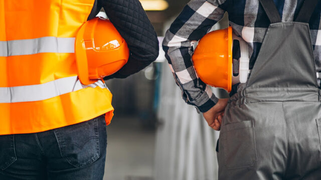 Two colleagues at a factory